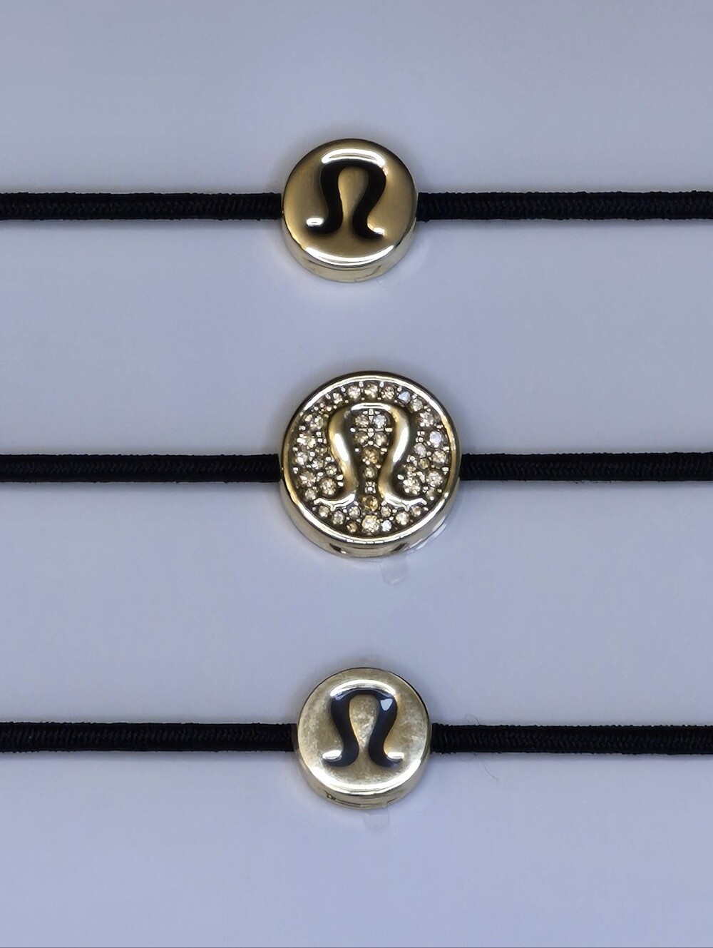 Lululemon 3 Elastic Hair Tie Set Gold Logo Charms Sparkly Braclet Zipper Pull